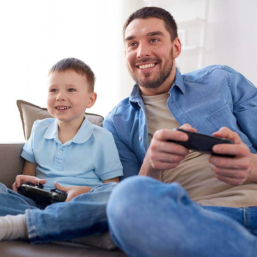Dad-and-son-playing-video-game-online
